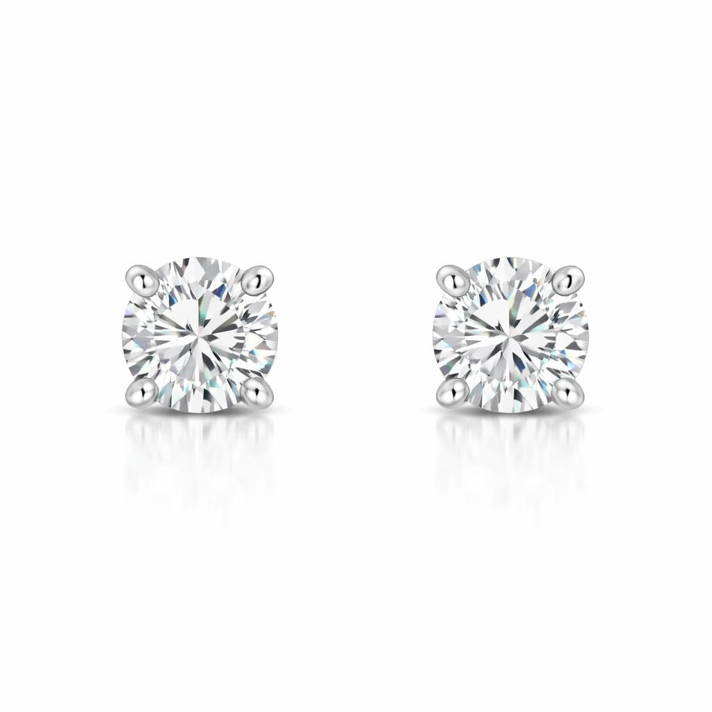 18 Karat White Gold Solitaire Studs