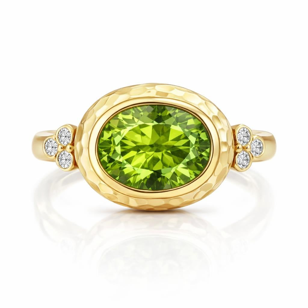 Bezel Set Peridot Ring in 14 Karat Yellow Gold