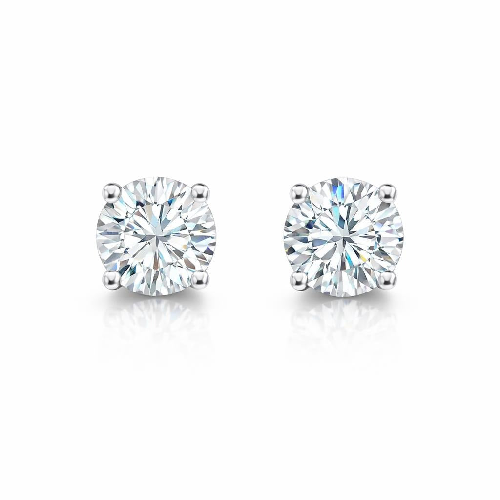 14 Karat White Gold Solitaire Studs