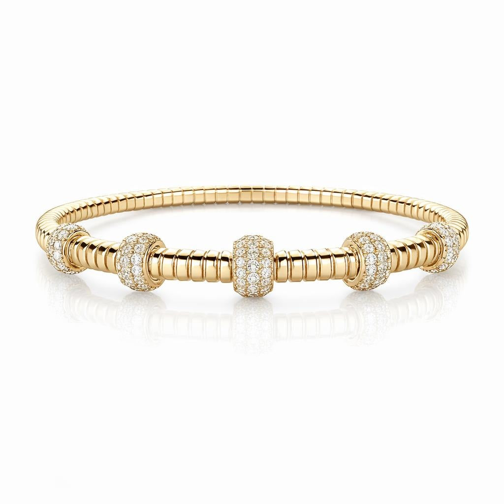 14 Karat Yellow Gold Bangle with Diamond Accents