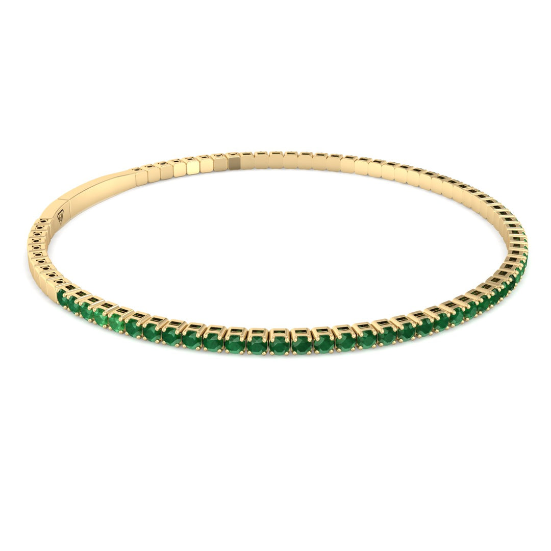 Christmas Flex Bangle Bracelet in 14 Karat Yellow Gold with Round Emerald 0.96 ct