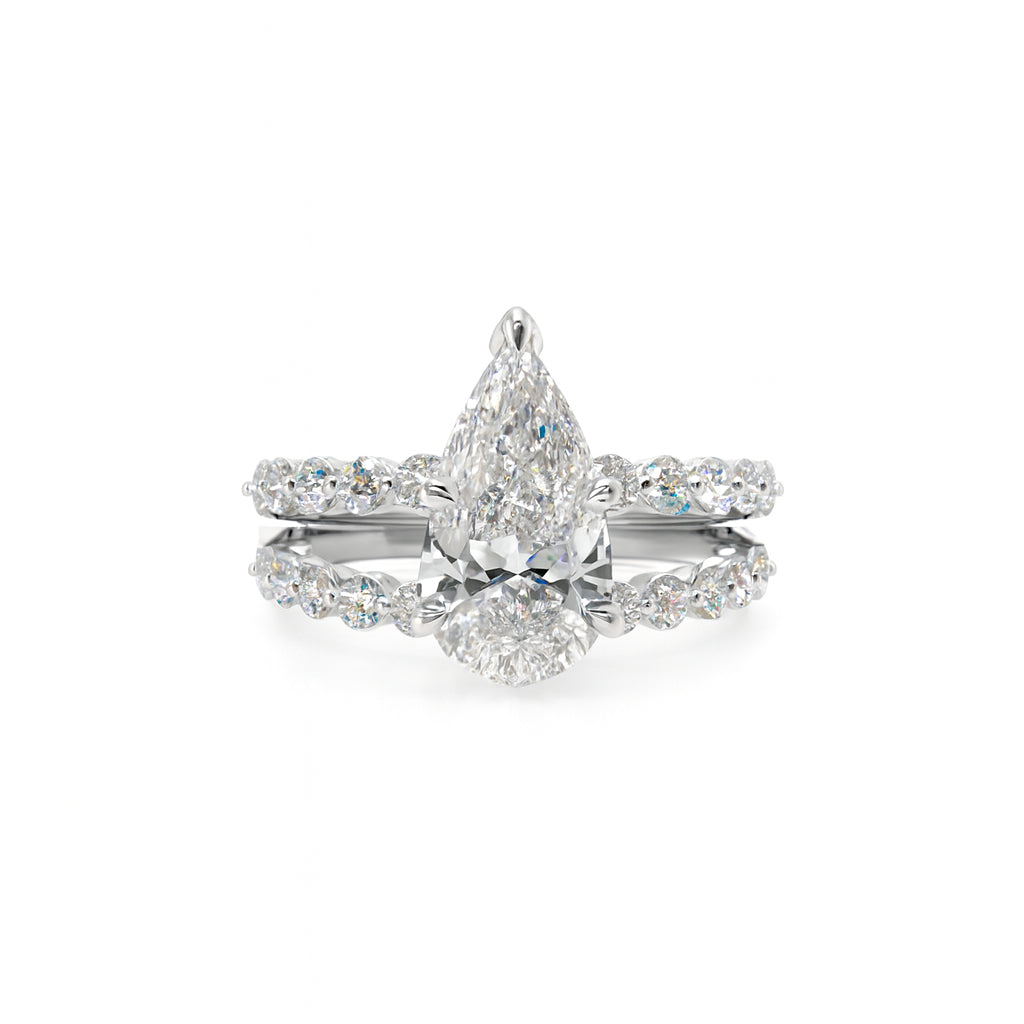 Sparkling Elegance: 14 Karat White Gold Pear Cut Bubble Band Wedding Set with Lab Diamonds (2.05 ct)