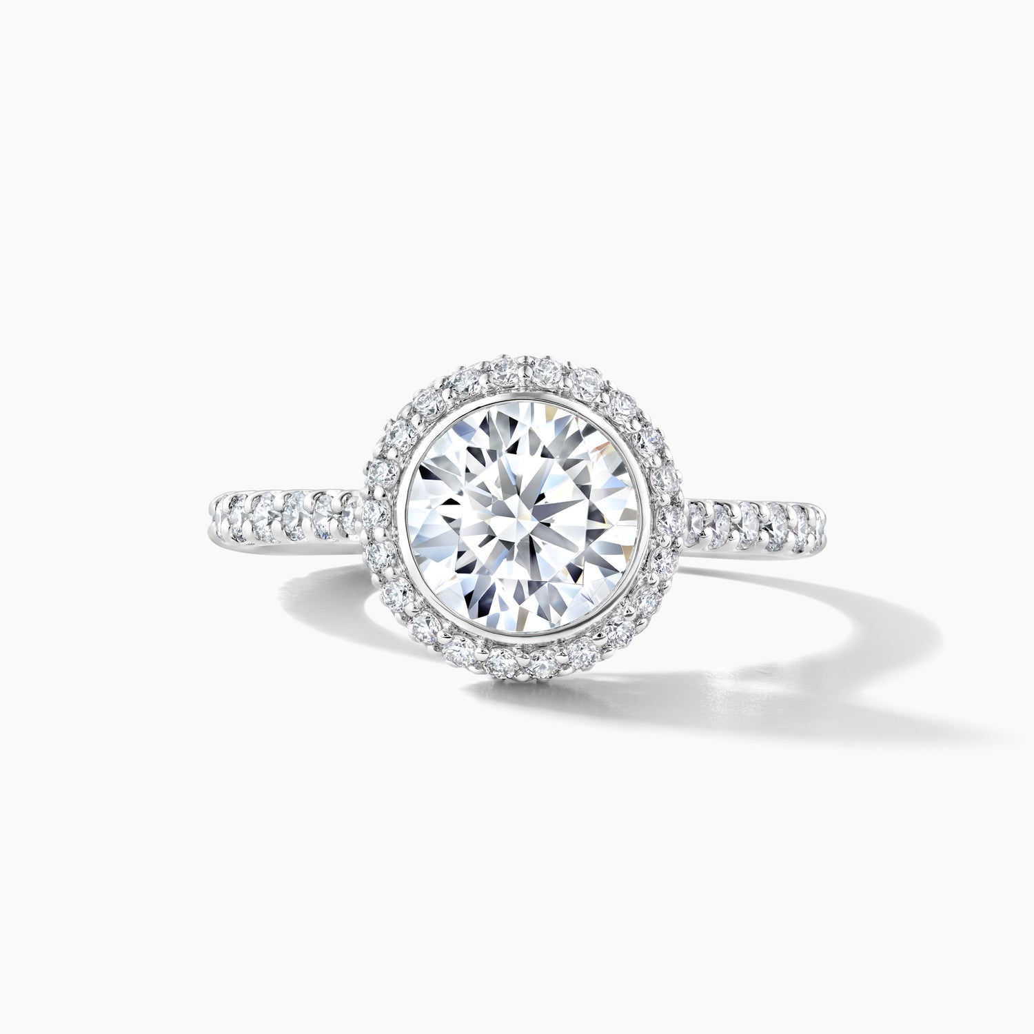 Platinum Engagement Mounting with Bezel Set Pave Halo and Diamond Band