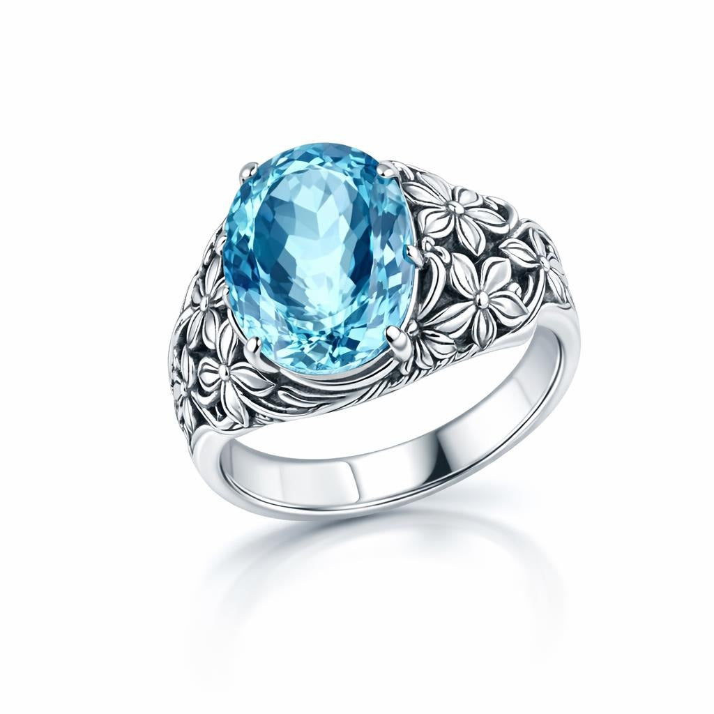 Blue Topaz Ring With Floral Design