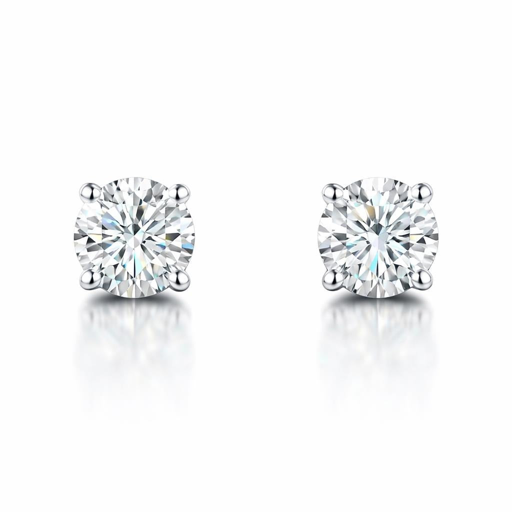 14 Karat White Gold Solitaire Studs