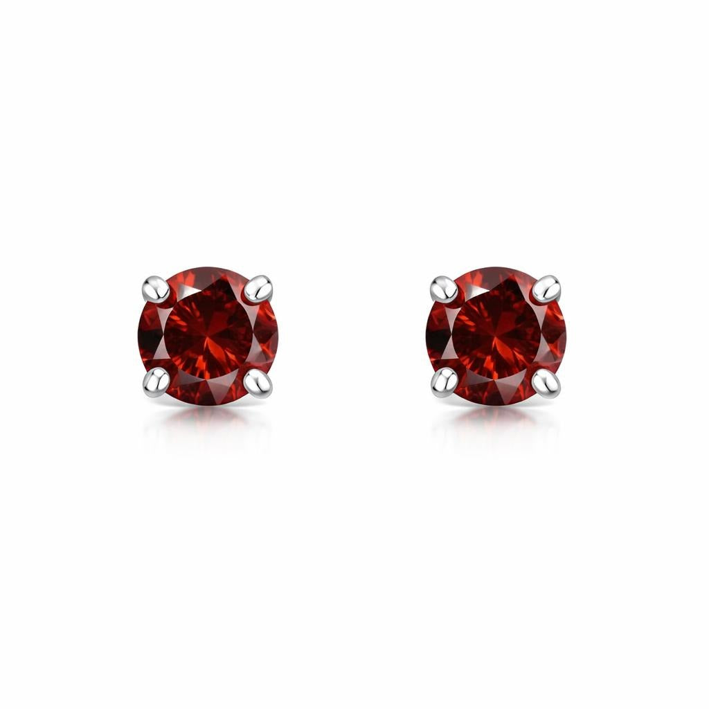 14 Karat White Gold Solitaire Studs with January Birthstone