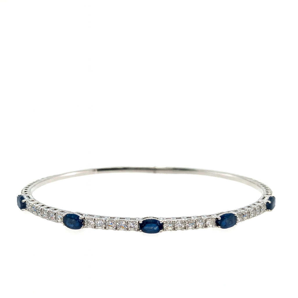 14 Karat White Gold Flex Bangle Bracelet with Oval Shape Blue Sapphire - 1.57 ct