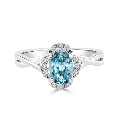 Oval Aquamarine Floral Diamond Halo Ring in 14 Karat White Gold (0.68 ct)