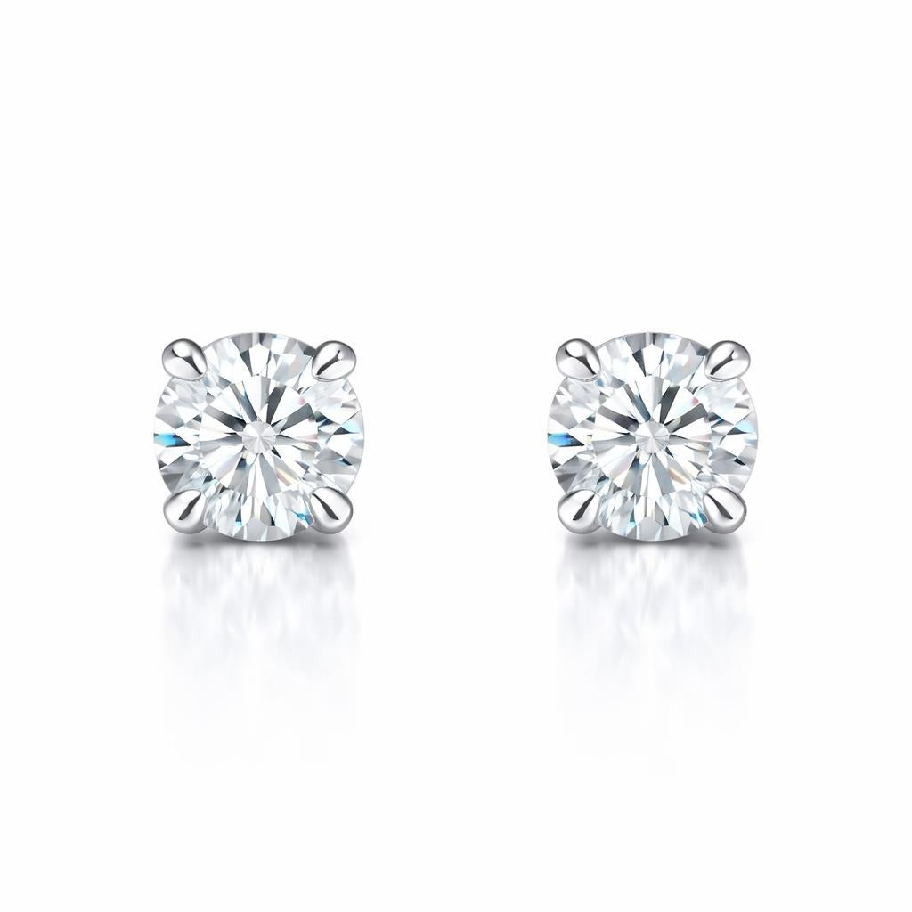 14 Karat White Gold Solitaire Studs