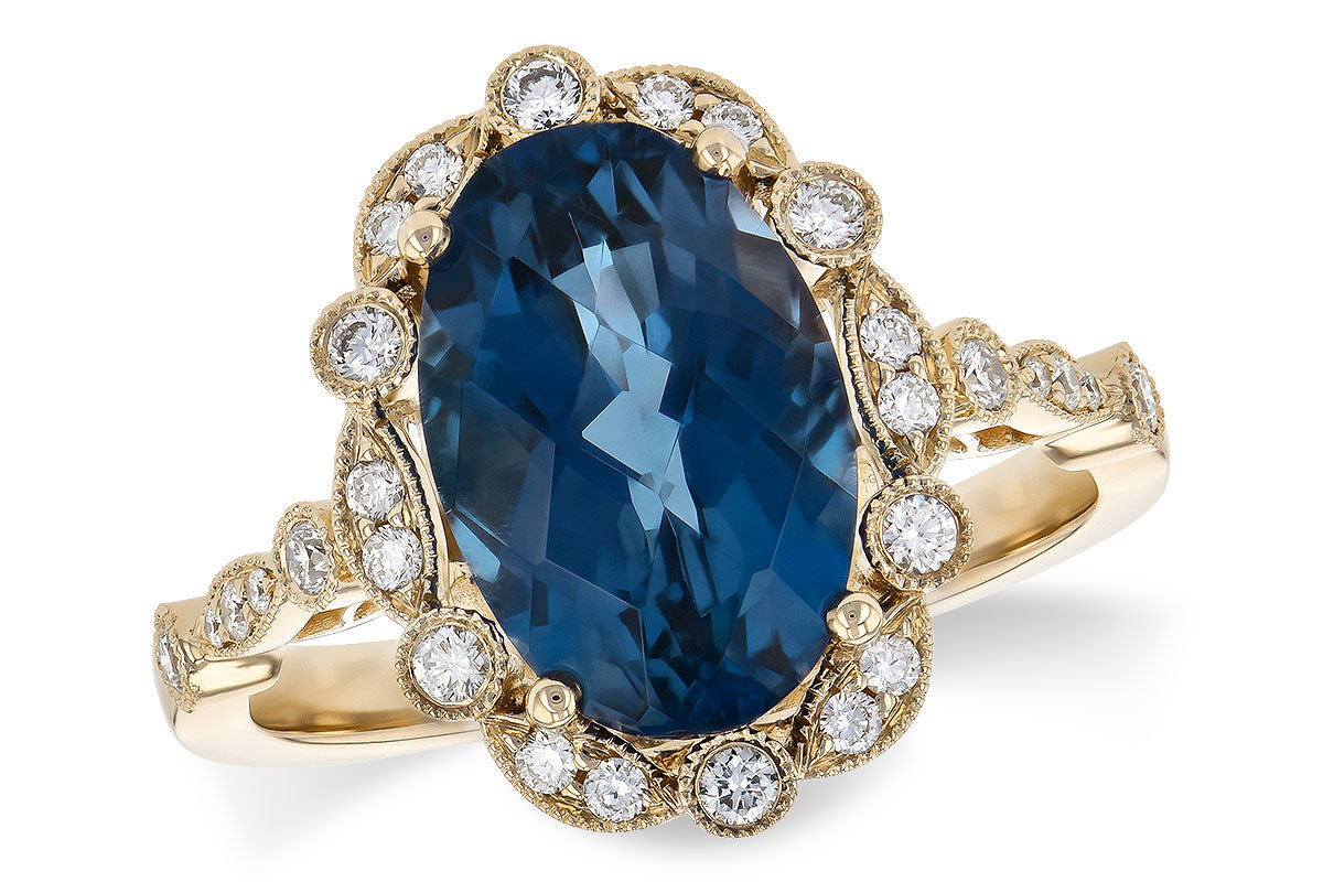 Milgrain Oval Blue Topaz Ring in 14 Karat Yellow Gold - 3.80 Carats