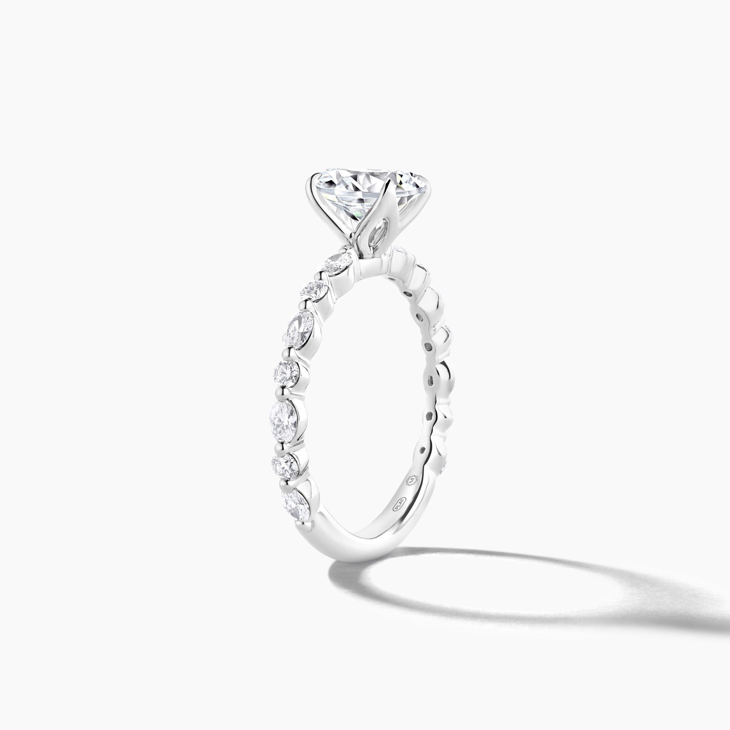 Platinum Oval and RBC Alternating Diamond Band Engagement Mounting