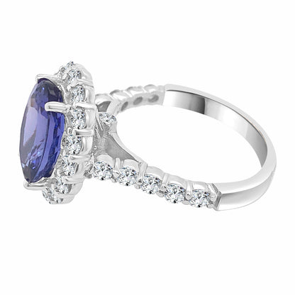Sure! How about this title: Halo Oval Tanzanite Ring in 14 Karat White Gold - 3.58 Carats