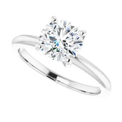 Sure! How about Round 1.00 Carat Natural Diamond Engagement Ring in 14 Karat White Gold?