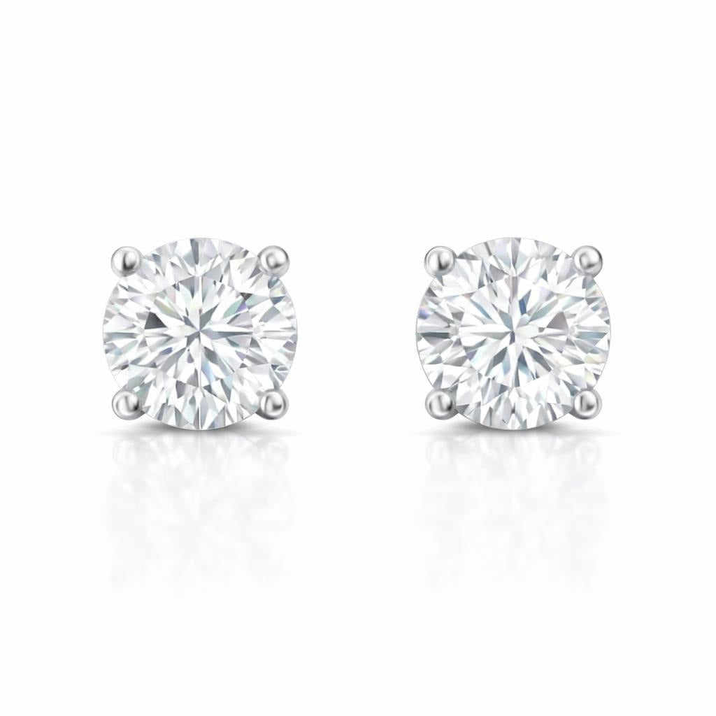 14 Karat White Gold Solitaire Studs