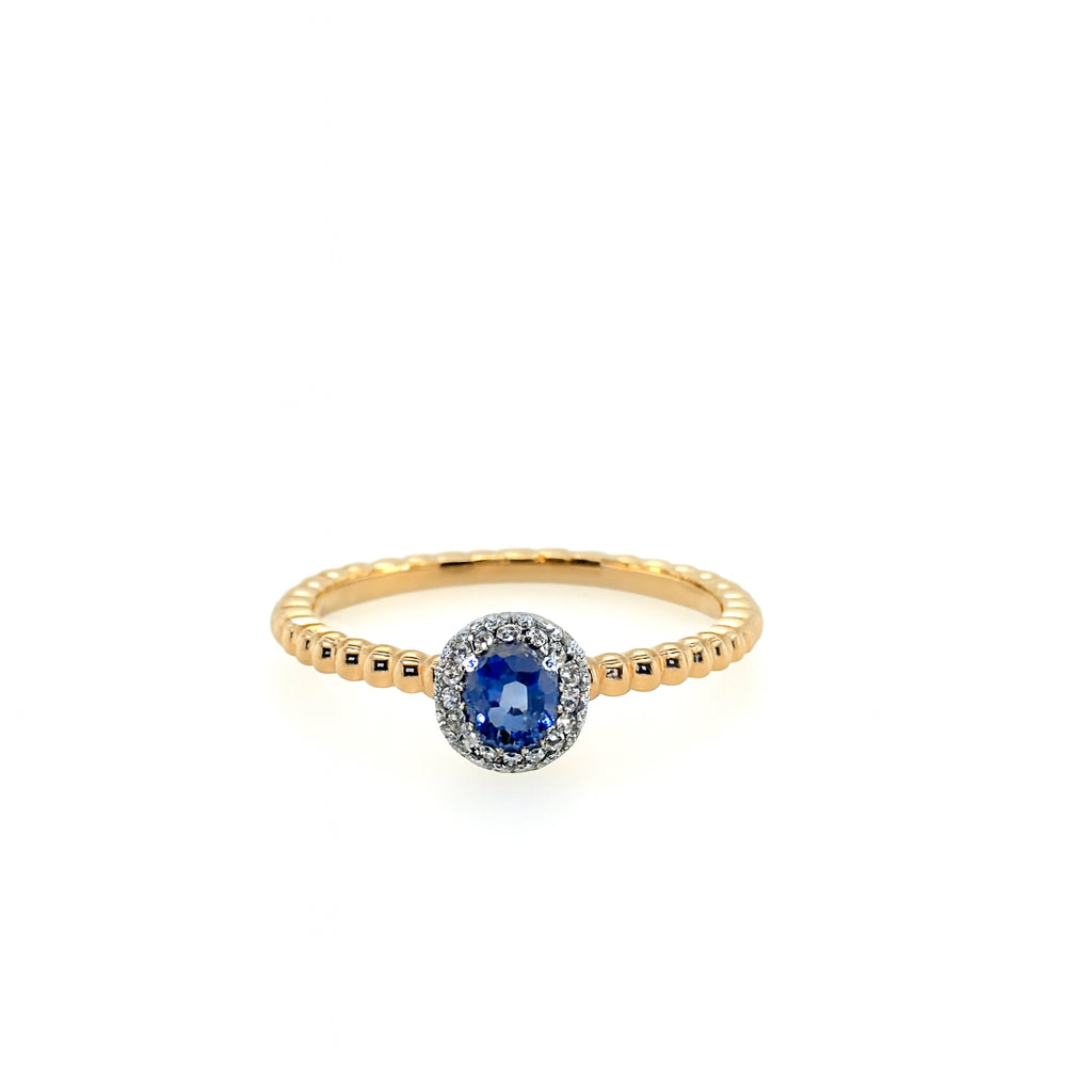 14 Karat Two-Tone Blue Sapphire and Diamond Ring with Oval Shape 0.23 ct