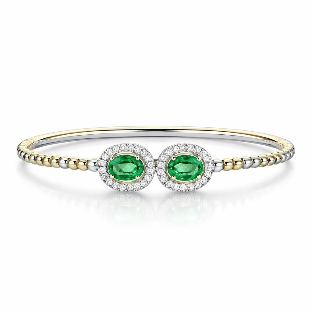 14 Karat Two-Tone Bangle with Emeralds
