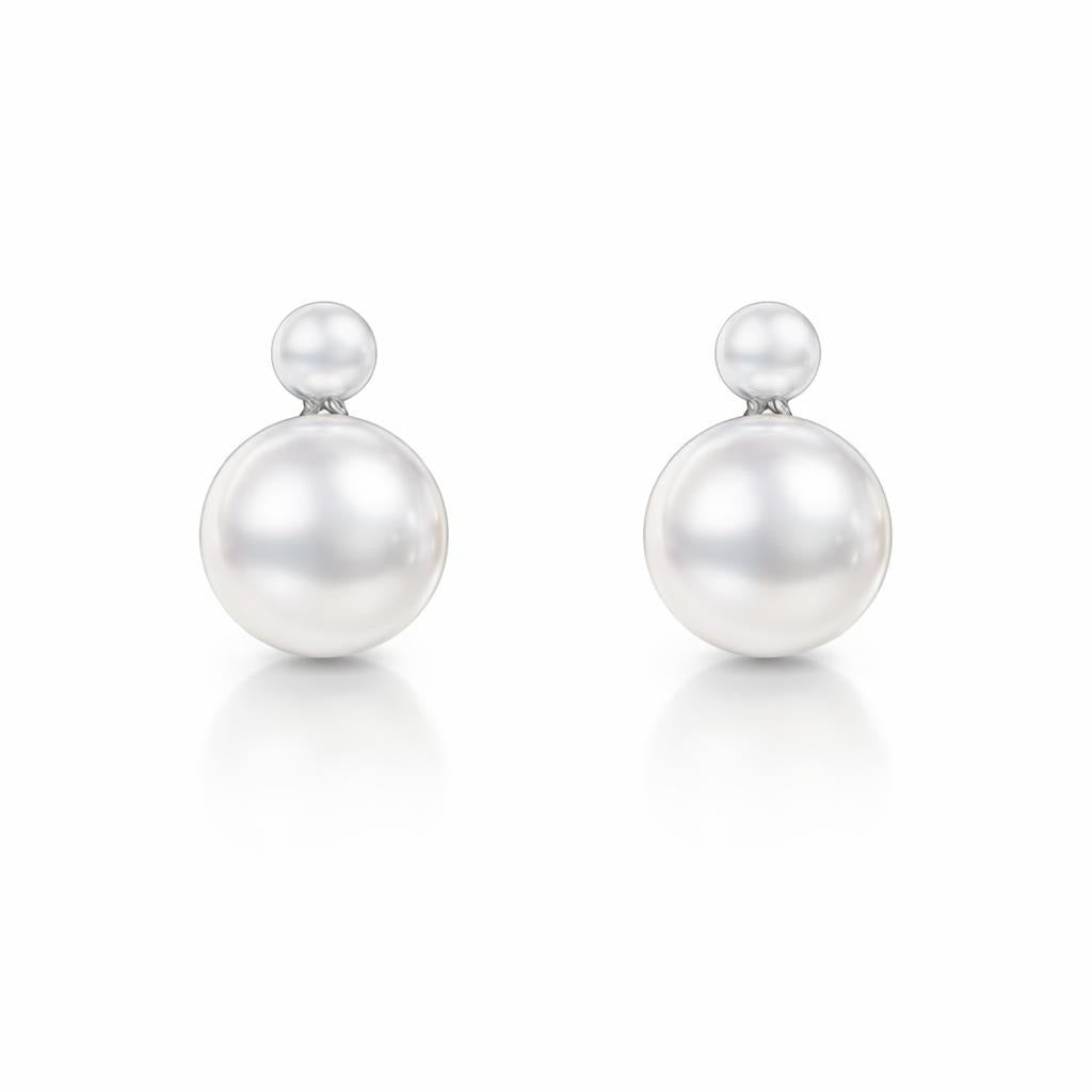 14 Karat White Gold Solitaire Studs