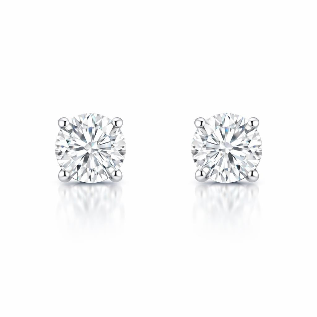 18 Karat White Gold Solitaire Studs